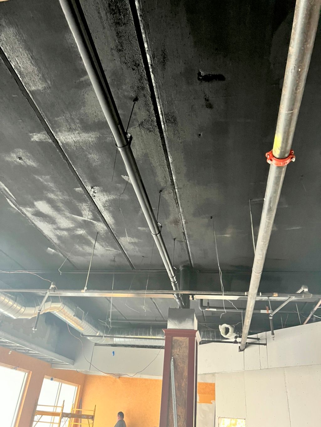 Real commercial open-ceiling coating project in progress